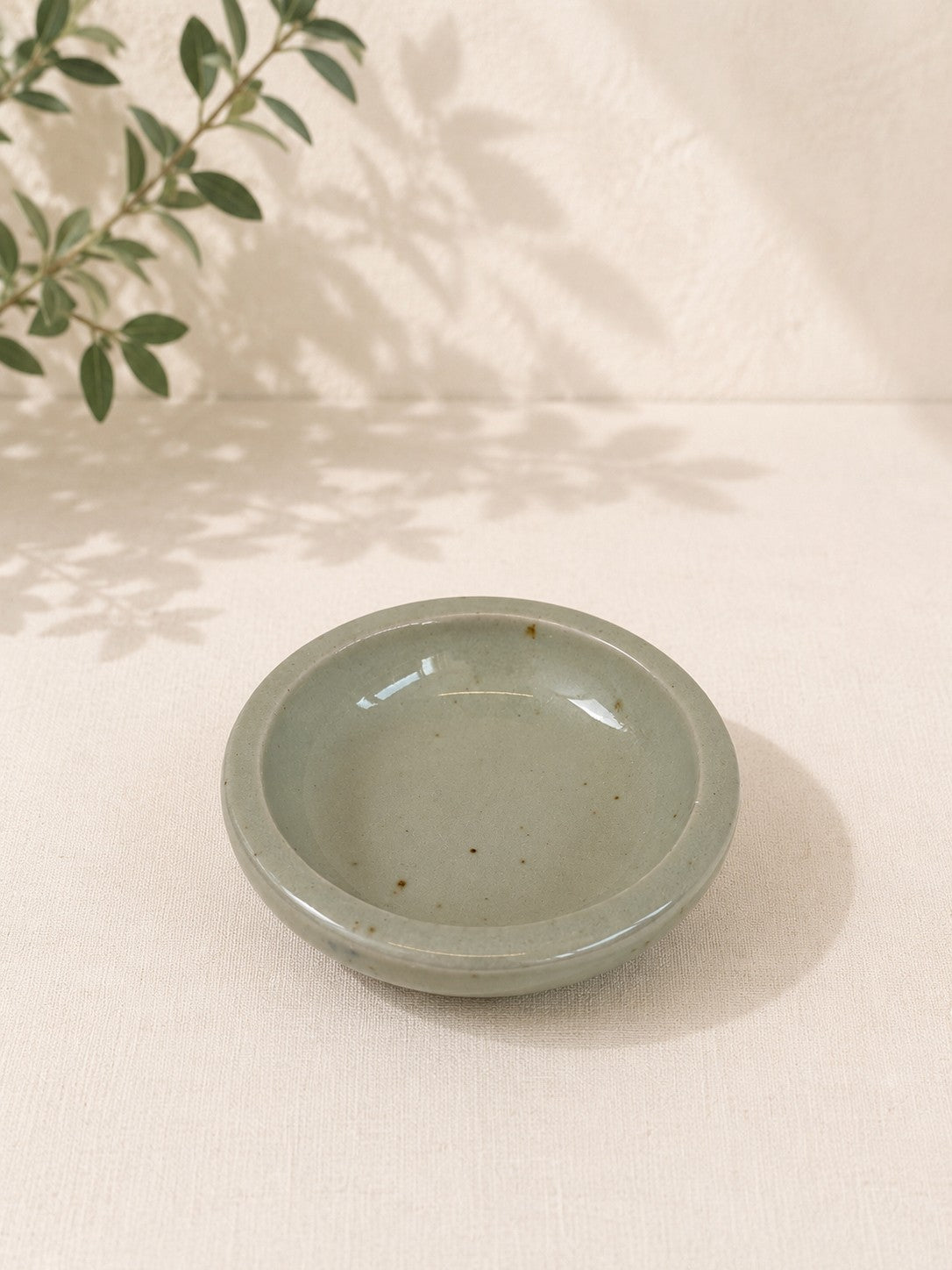 Piattino portacandela artigianale in ceramica